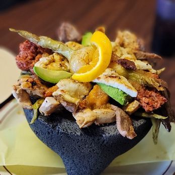 Mariscos Los Portales signature dishes Shrimp TostadaChorizoCarne Asada Burrito